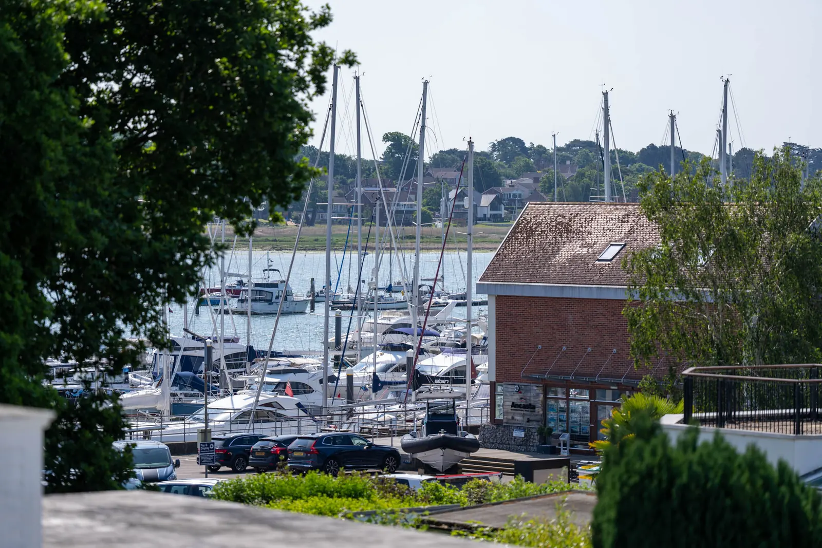 Yachts moored at Port Hamble Marina on the River Hamble, seen from the house